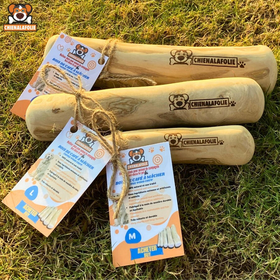 Three_coffee_wood_chew_sticks_with_official_Chienalafolie_labels_on_grass